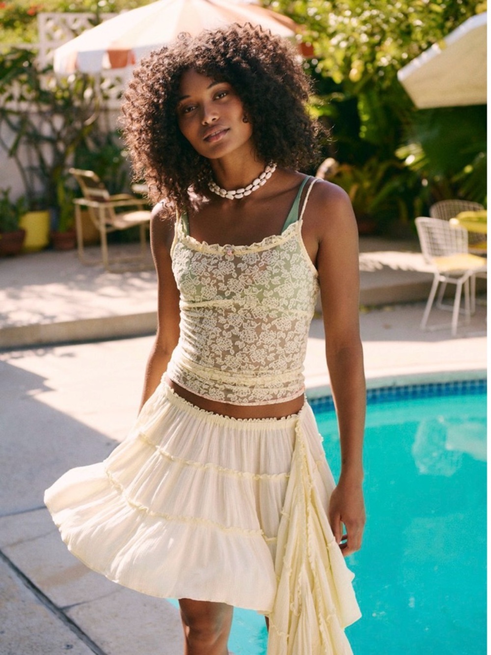 Free People Jolie Mini Skirt flowy tiered design with a cascading ruffle accent